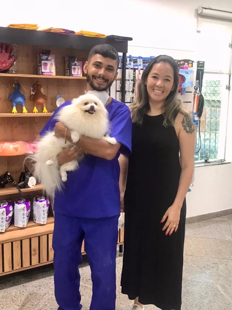 Equipe do Isaac Newton com um cão no atendimento